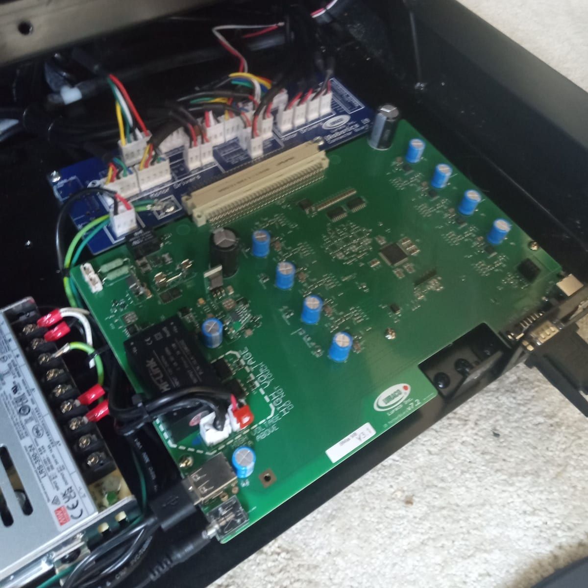 A massage chair's main control board and power supply, opened up for diagnosis.